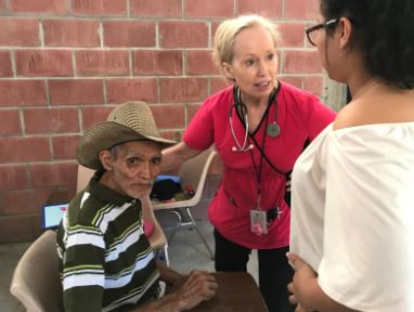 Eye doctor speaking to patient through translator